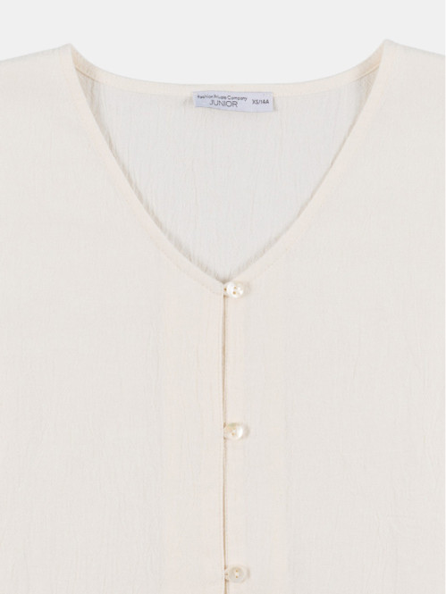 Blouse boutonnée et noeud...