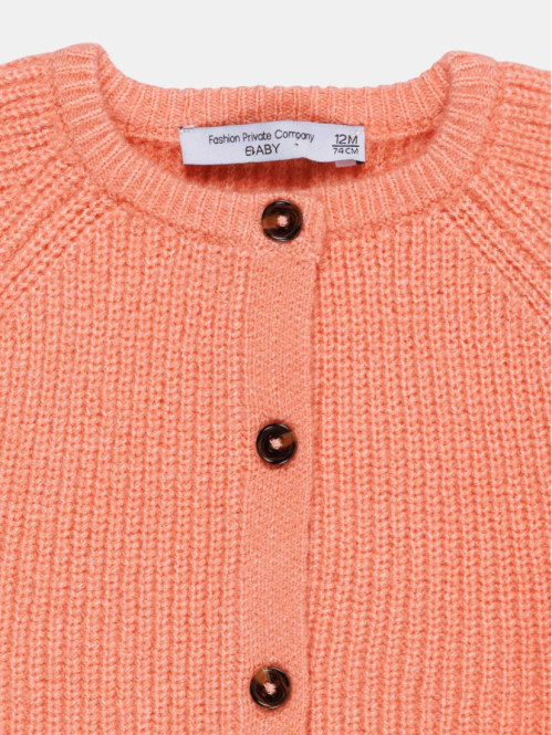 Gilet boutonné rose brique...