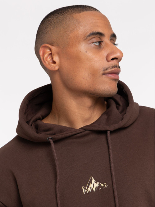Sweat capuche motif devant...