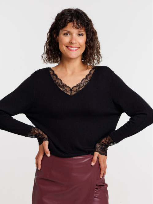 Pull noir poignets en...