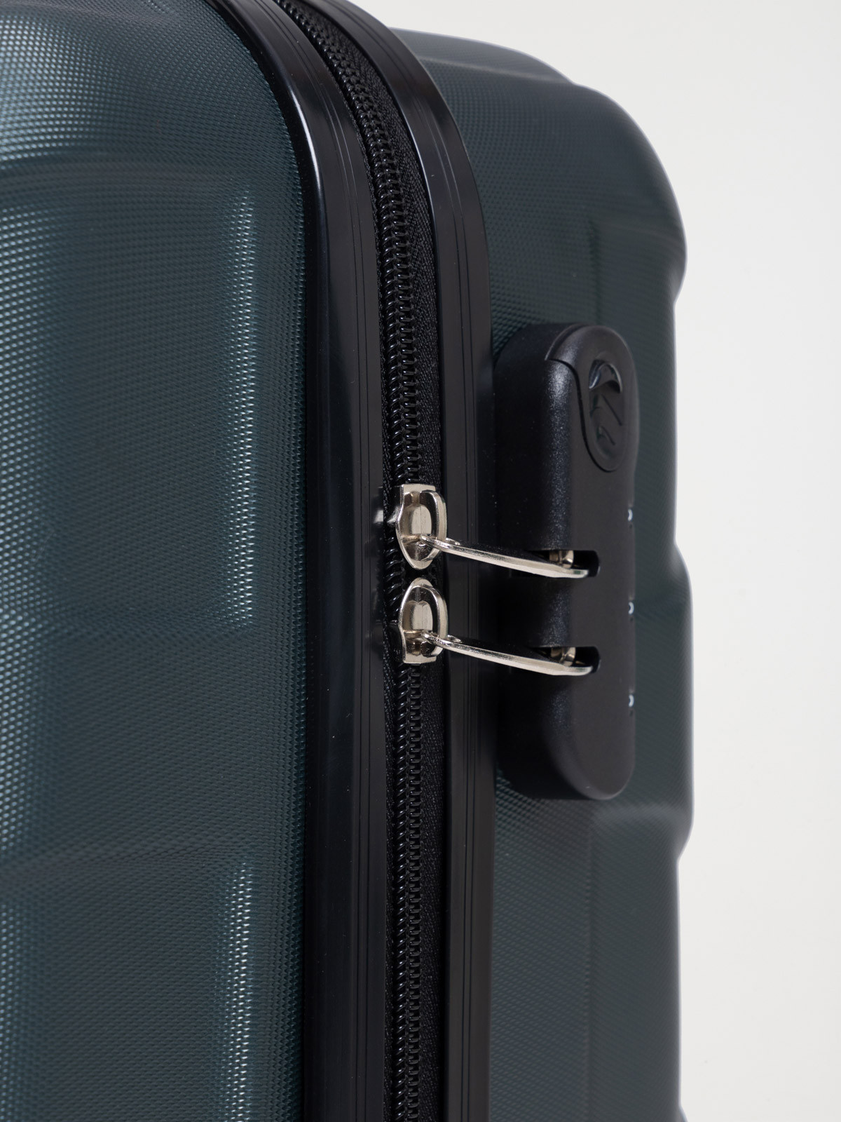 Valise rigide grise à roulettes 