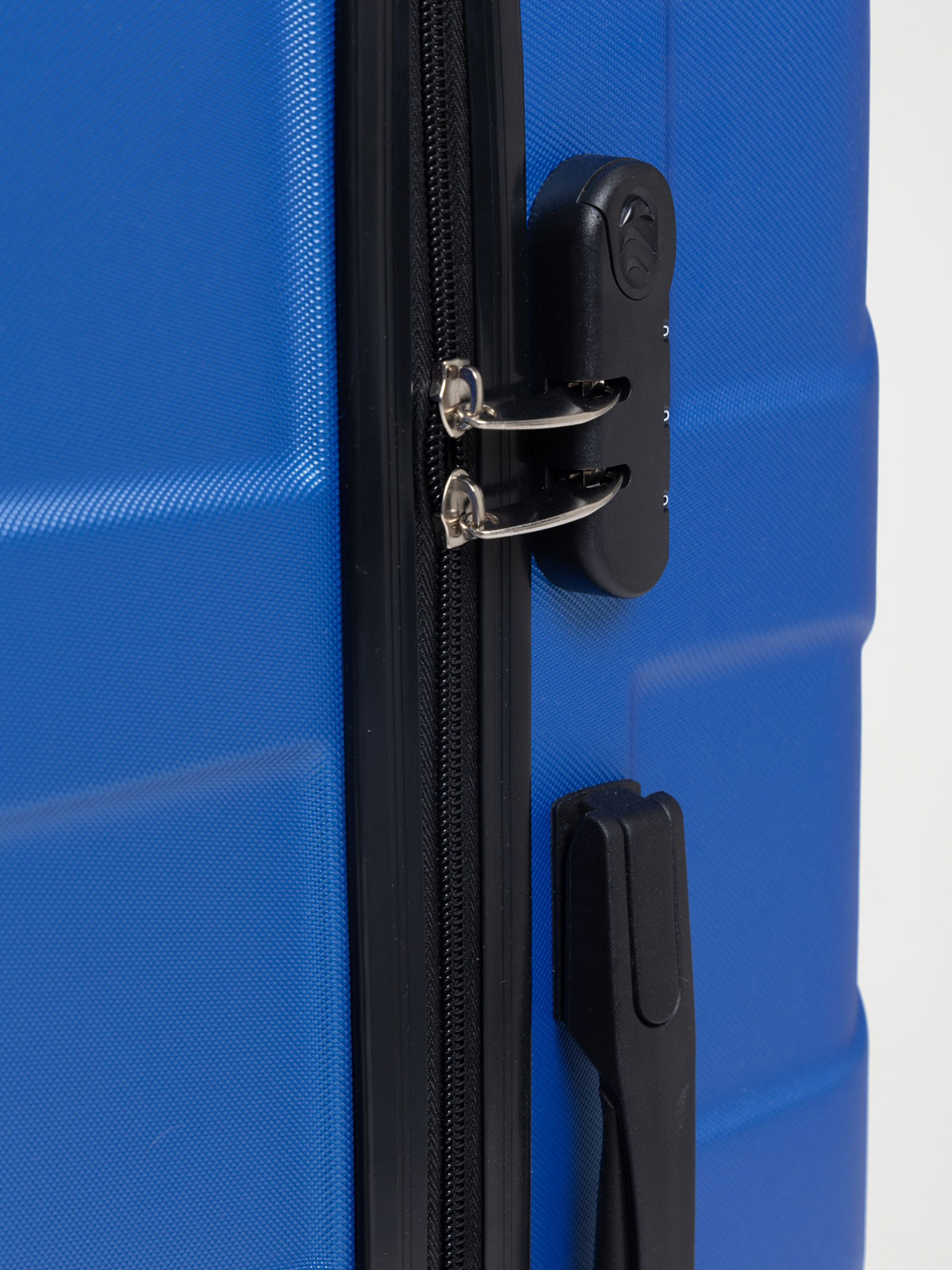 Valise rigide bleue à roulettes