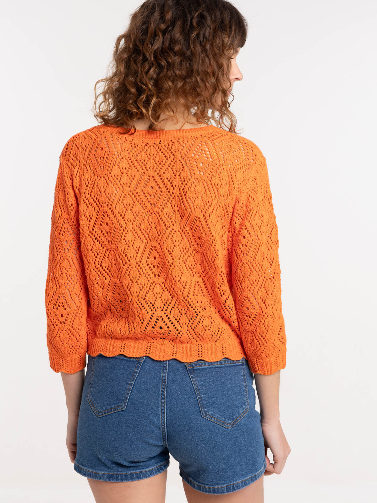 Pull orange vif femme