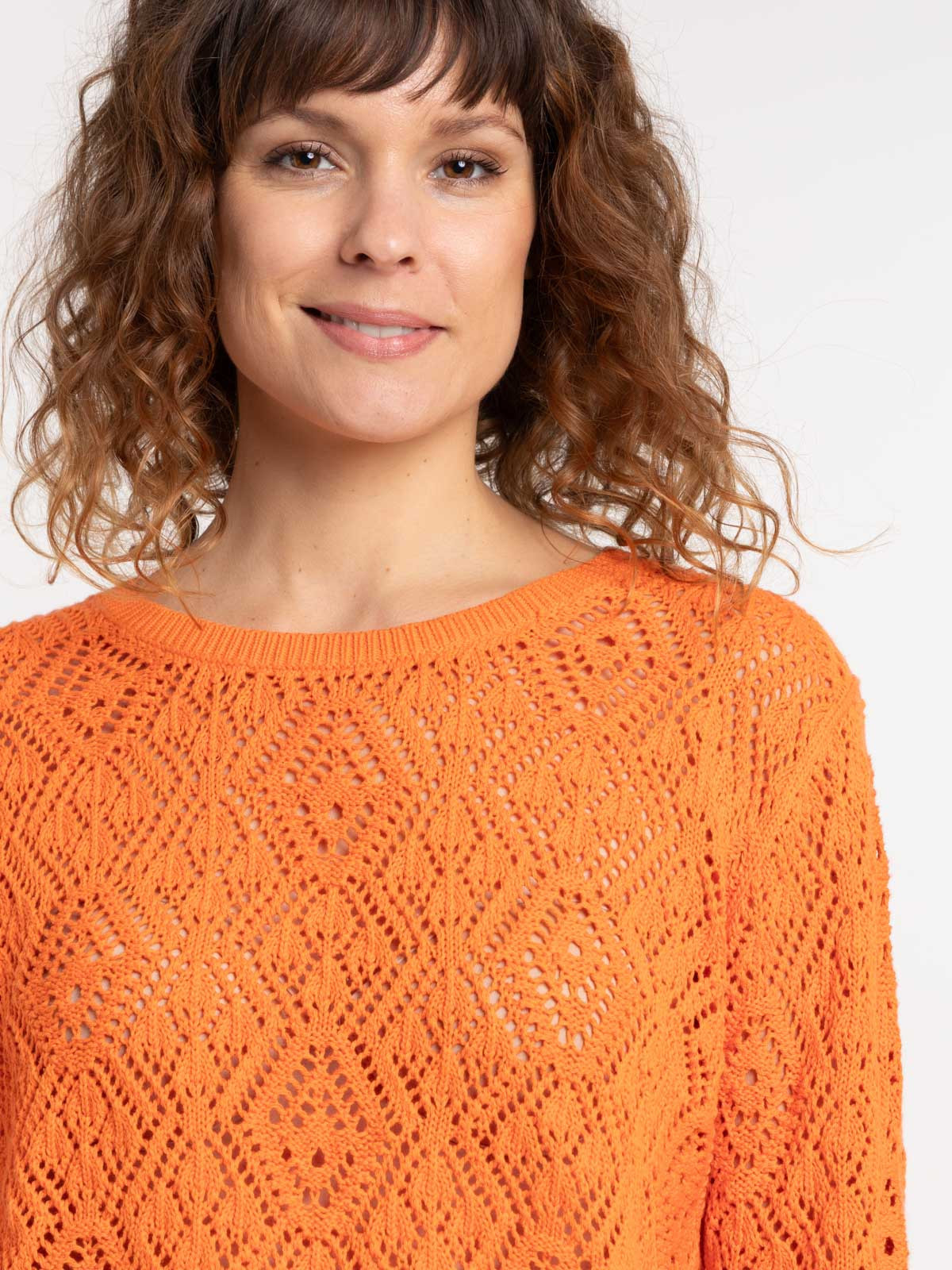 Pull orange vif femme