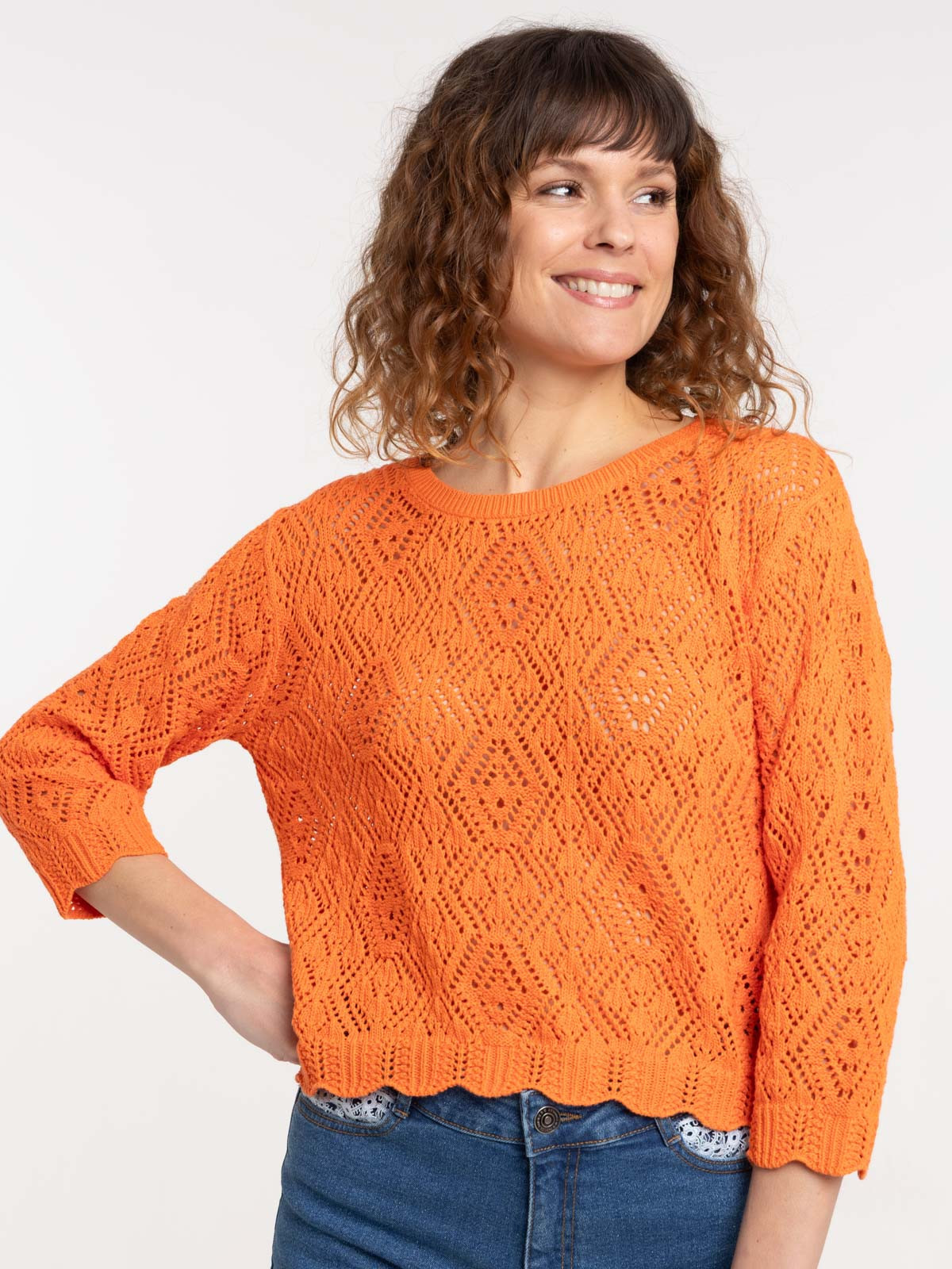Pull orange vif femme