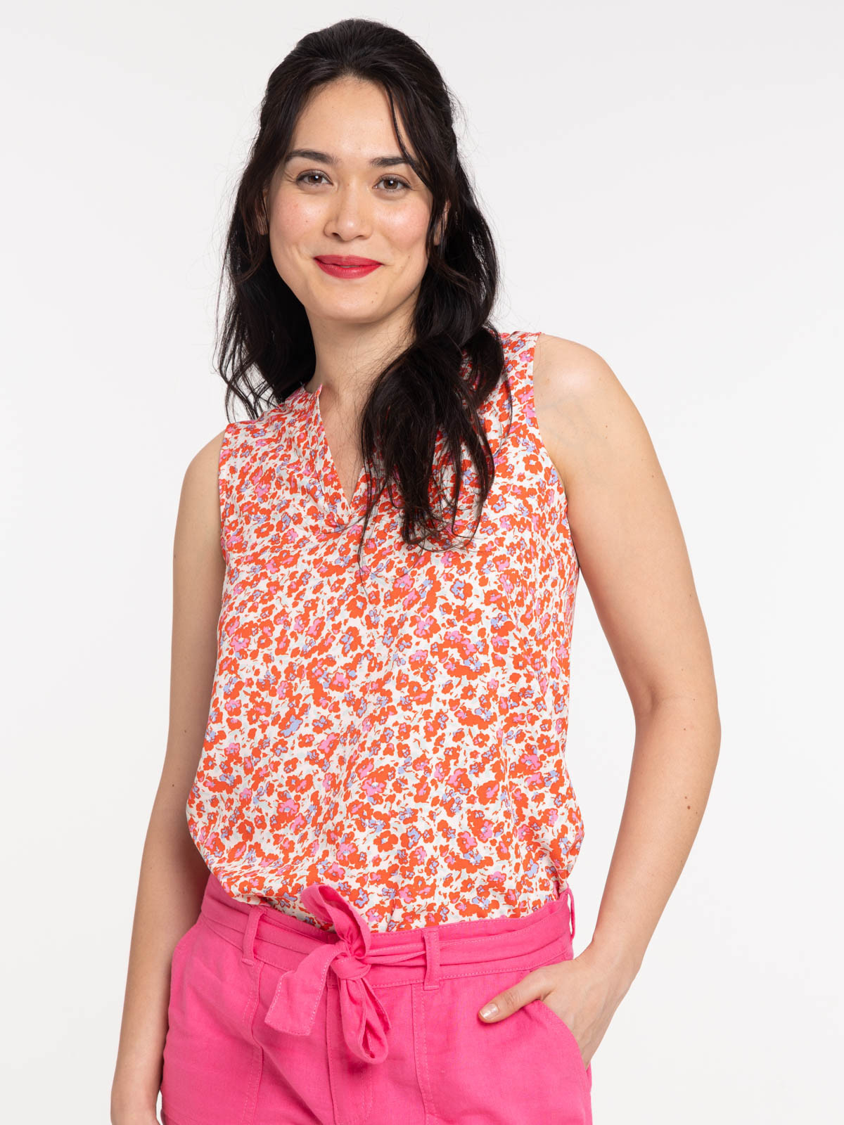 Blouse motif fleuri sans manches femme