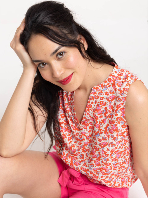 Blouse motif fleuri sans manches femme