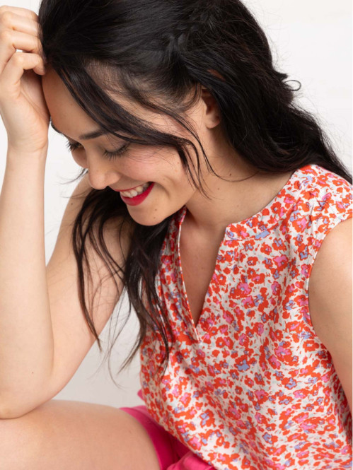 Blouse motif fleuri sans manches femme
