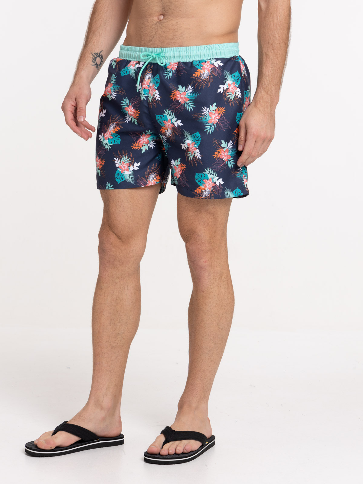 Short de bain motif feuillage homme