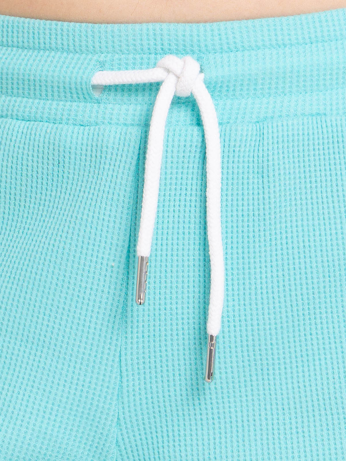 Short turquoise nid d'abeille femme Short turquoise nid d'abeille femme