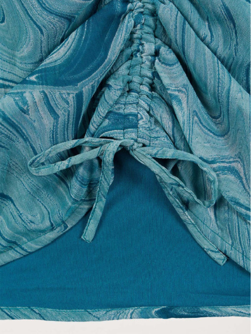 Blouse imprimée bleu paon...