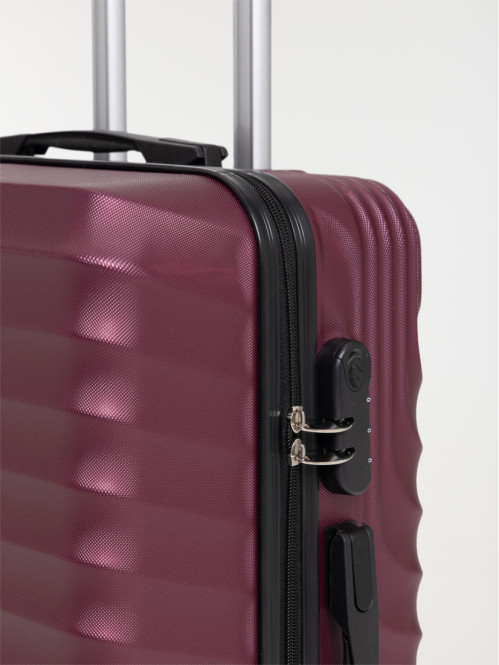 Valise rigide à roulettes rose