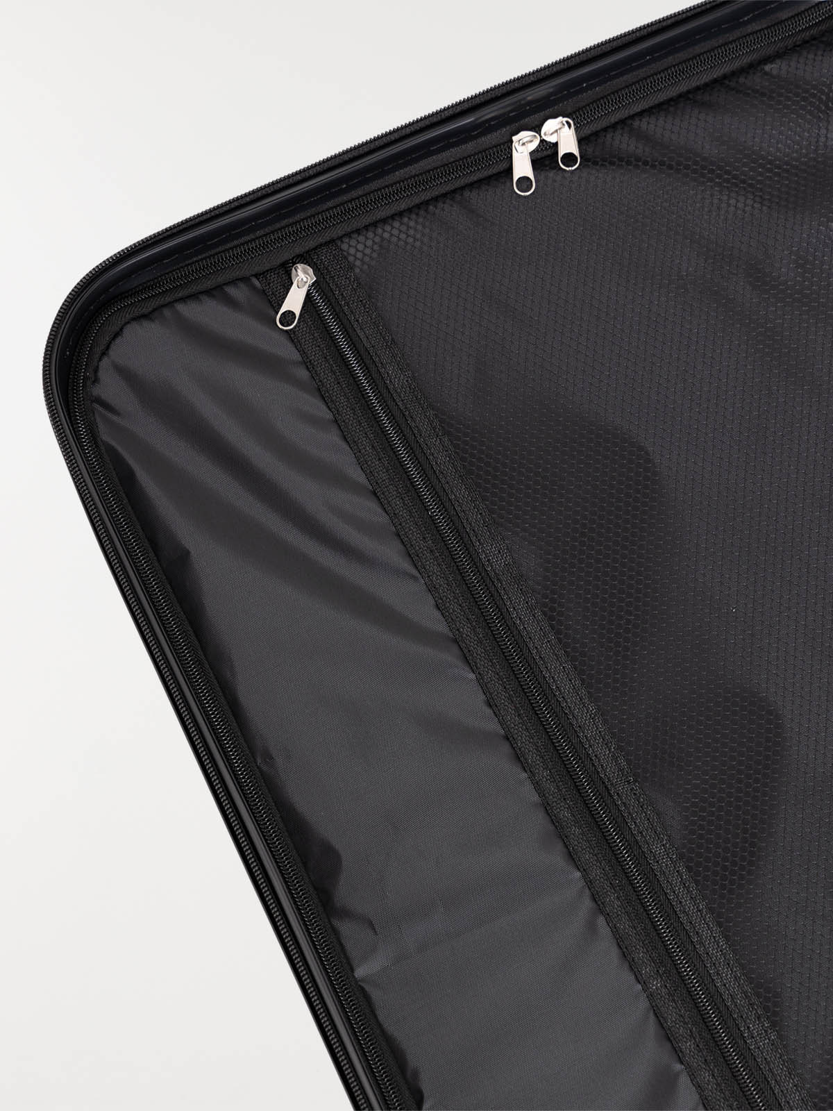 Valise rigide à roulettes rose