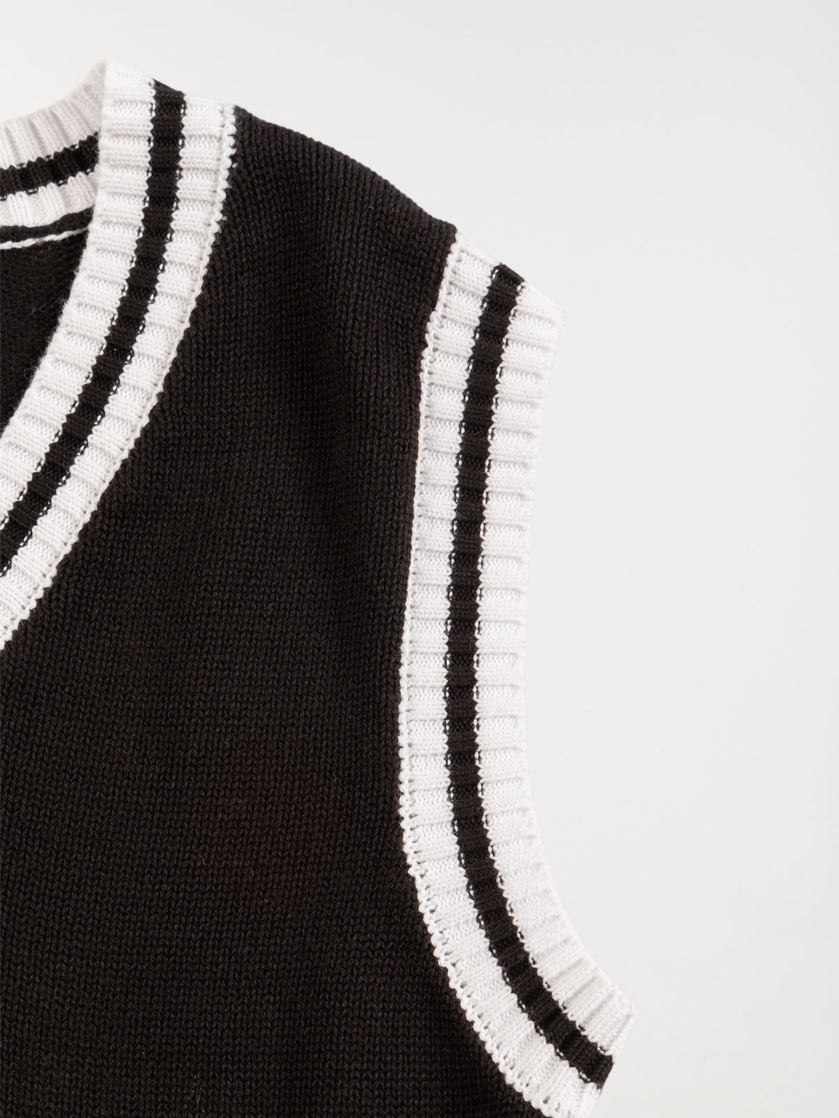 Pull sans manches noir fille (XXS-M)