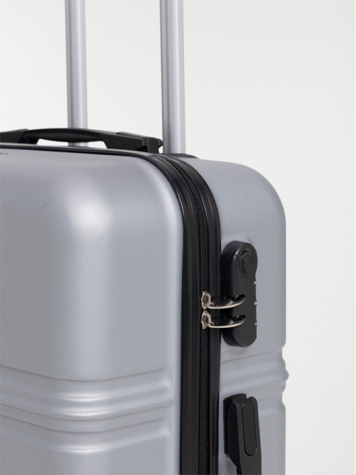 Valise rigide argentée à roulettes Valise rigide argentée à roulettes