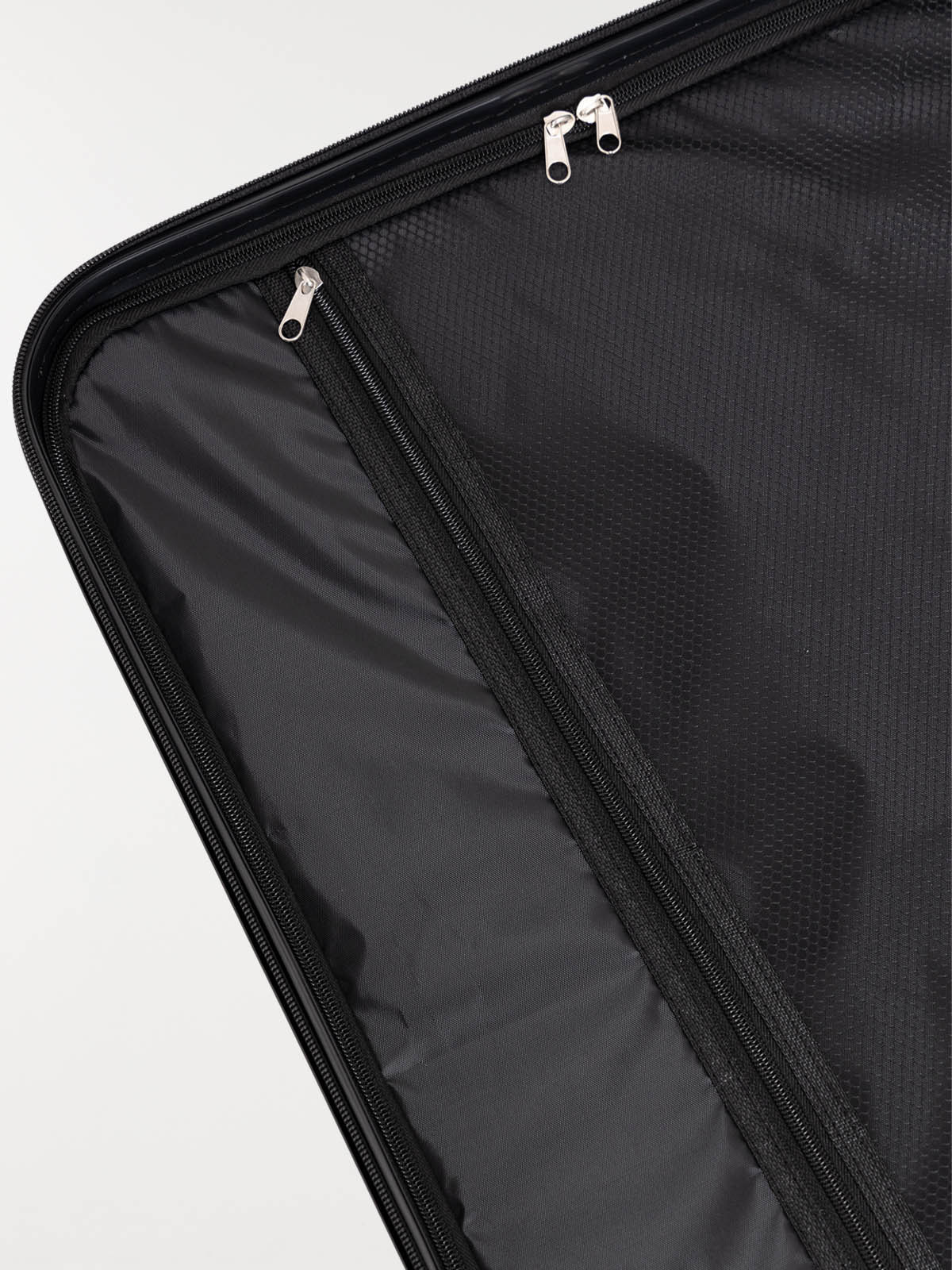 Valise rigide bleue à roulettes