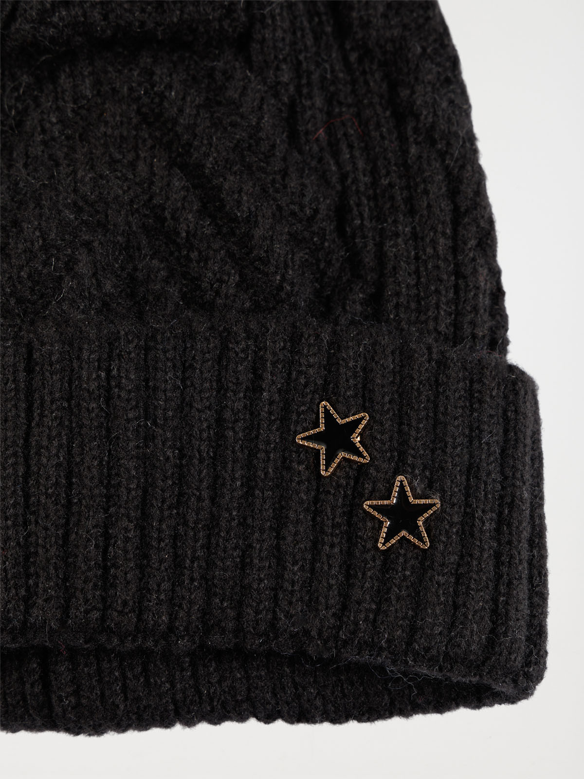 Bonnet noir torsadé pompon fille Bonnet noir torsadé pompon fille