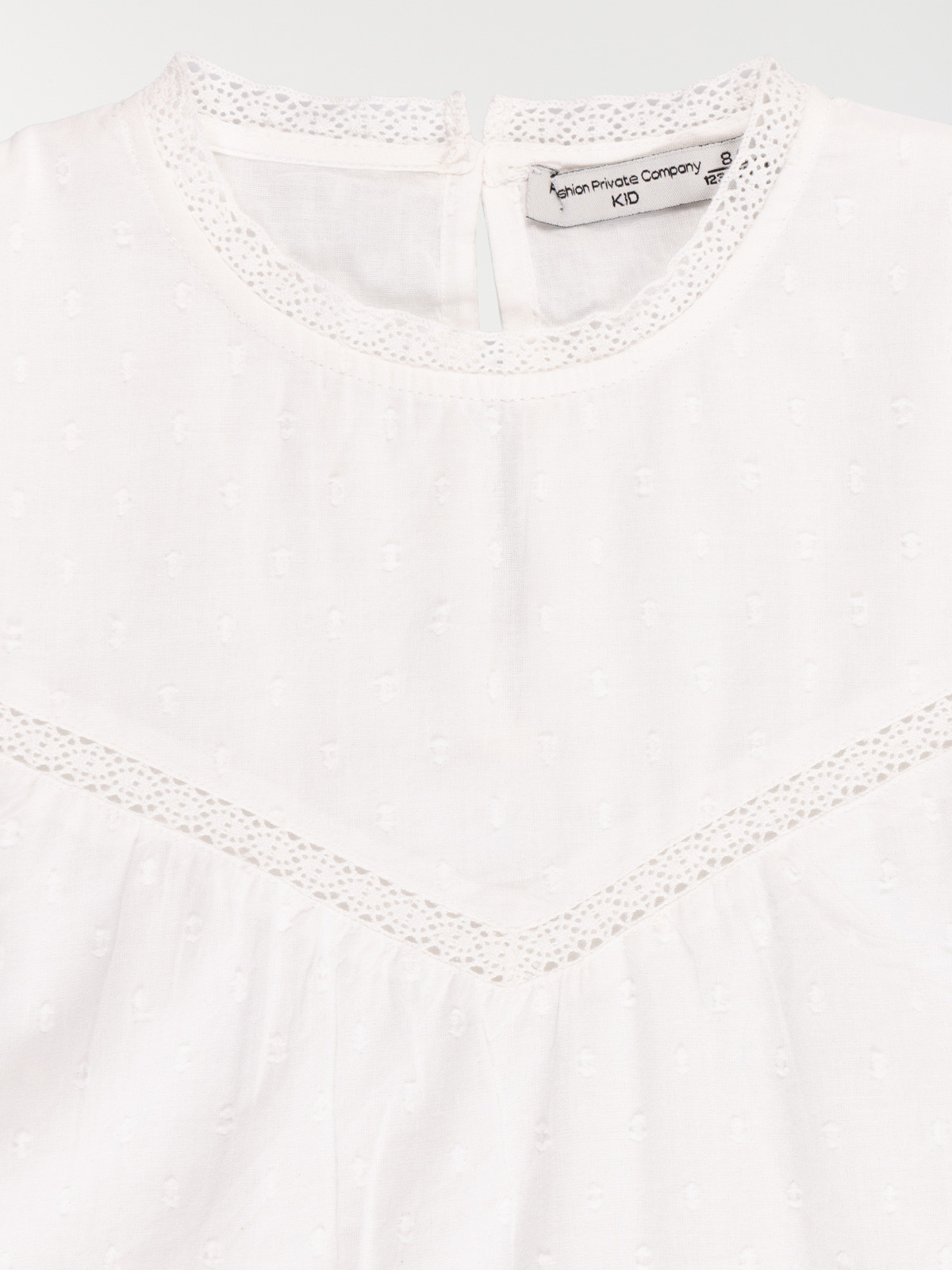 Blouse plumetis blanche fille (3-12A)
