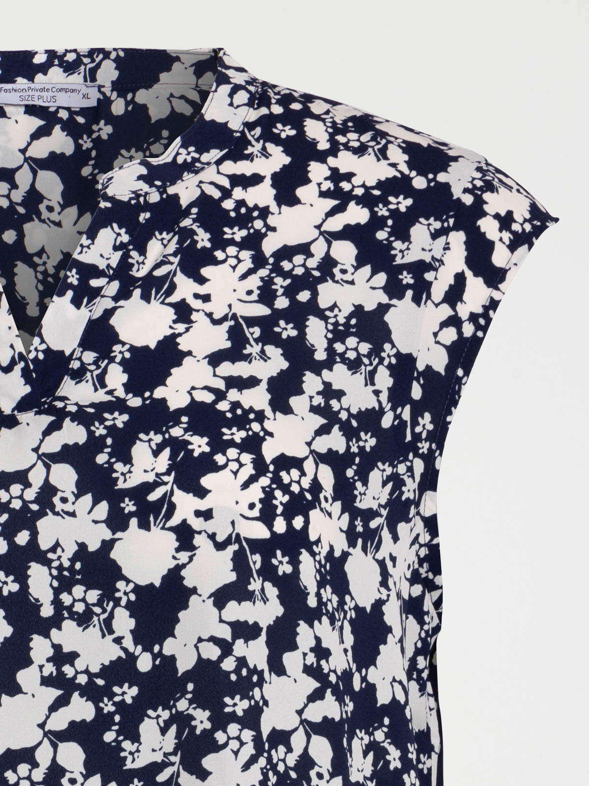 Blouse sans manches grande taille femme