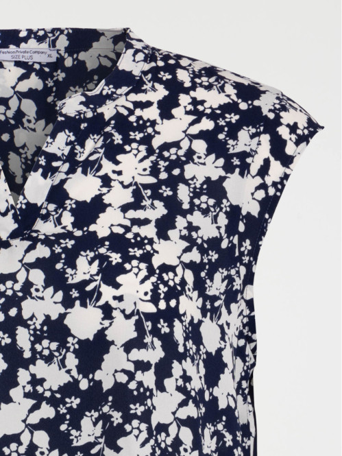 Blouse sans manches grande...