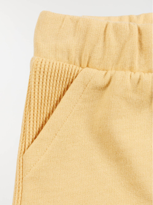 Short sable chaud garçon...