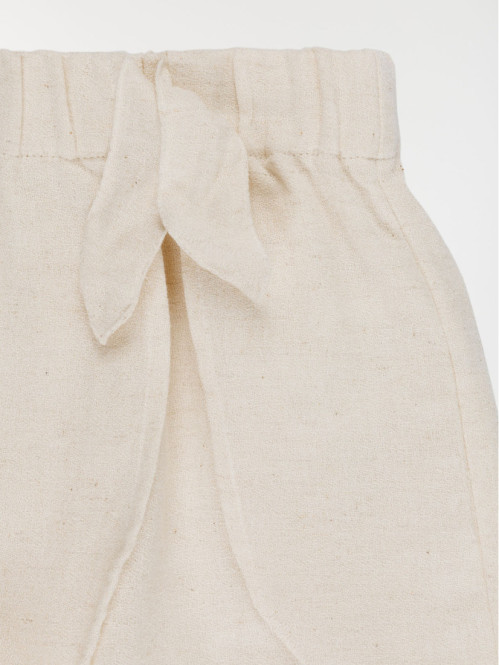 Jupe short uni noeud fille...