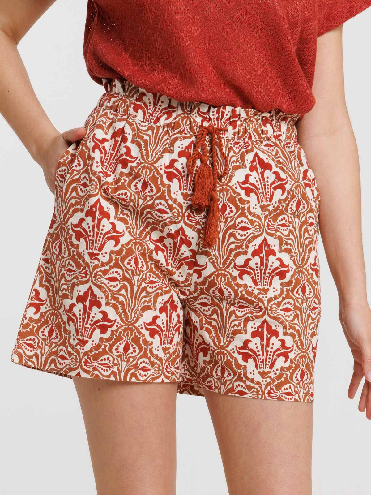 Short imprimé liens pompons femme Short imprimé liens pompons femme