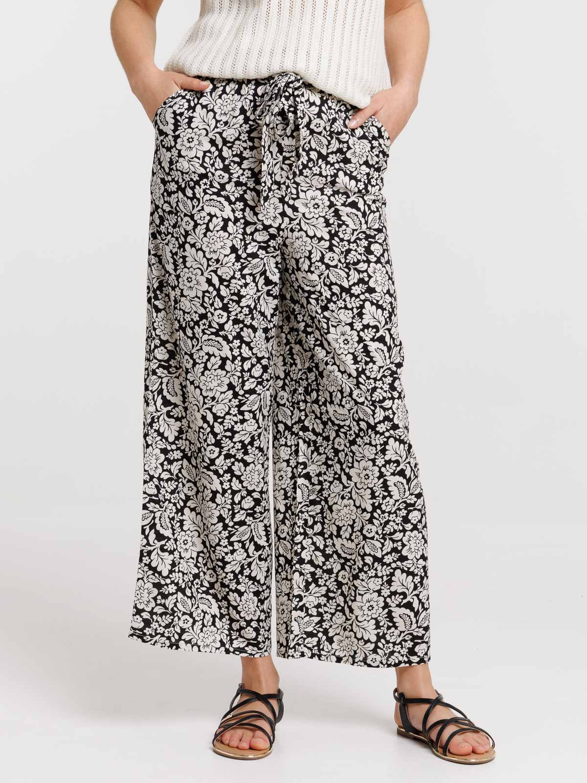Pantalon noir large fleuri femme