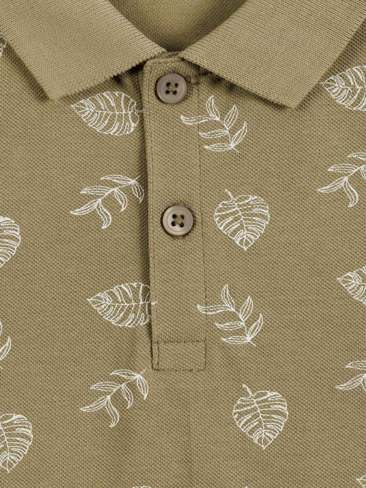 Polo motif feuillage garçon (3-12A) Polo motif feuillage garçon (3-12A)