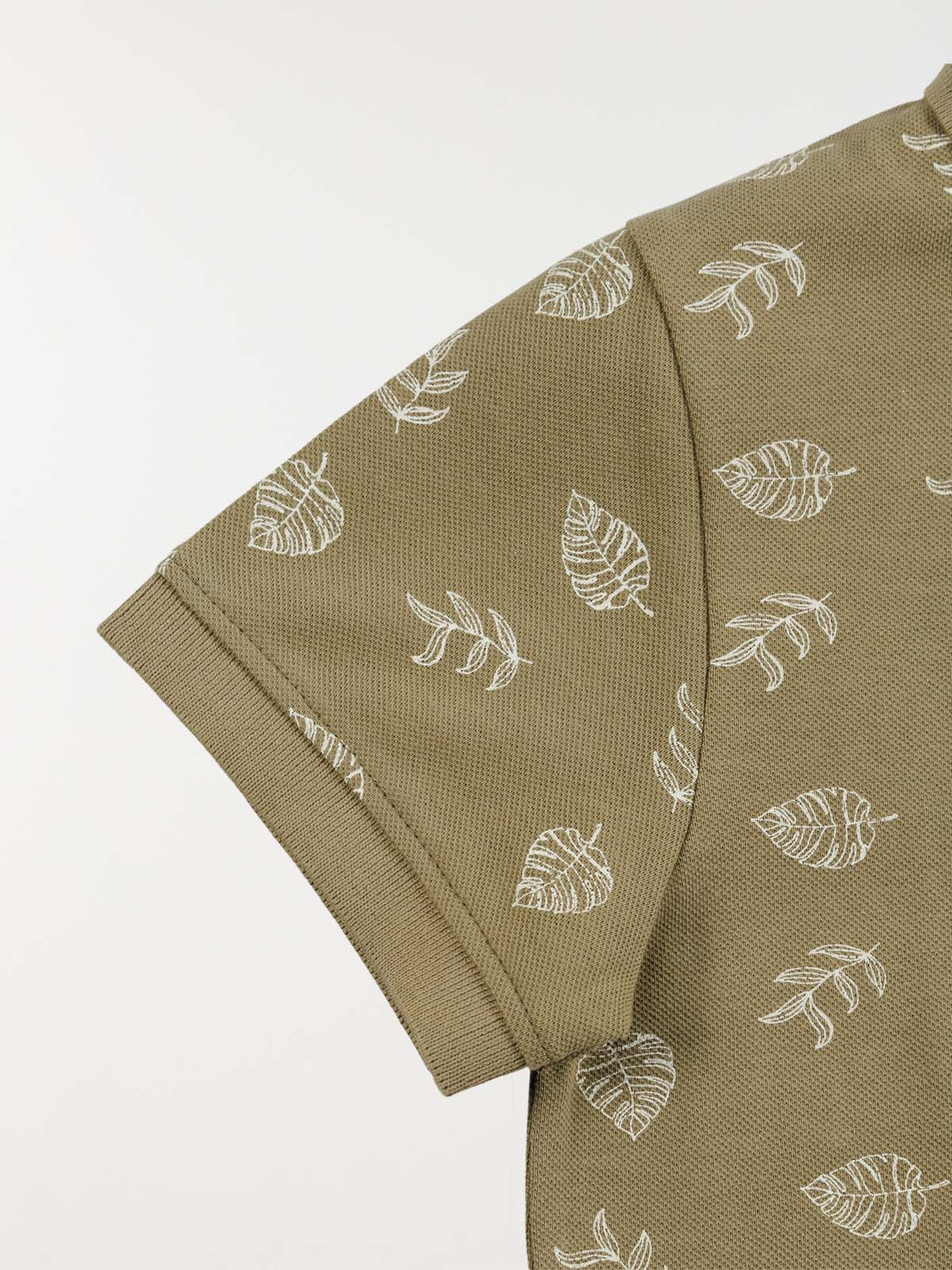 Polo motif feuillage garçon (3-12A) Polo motif feuillage garçon (3-12A)