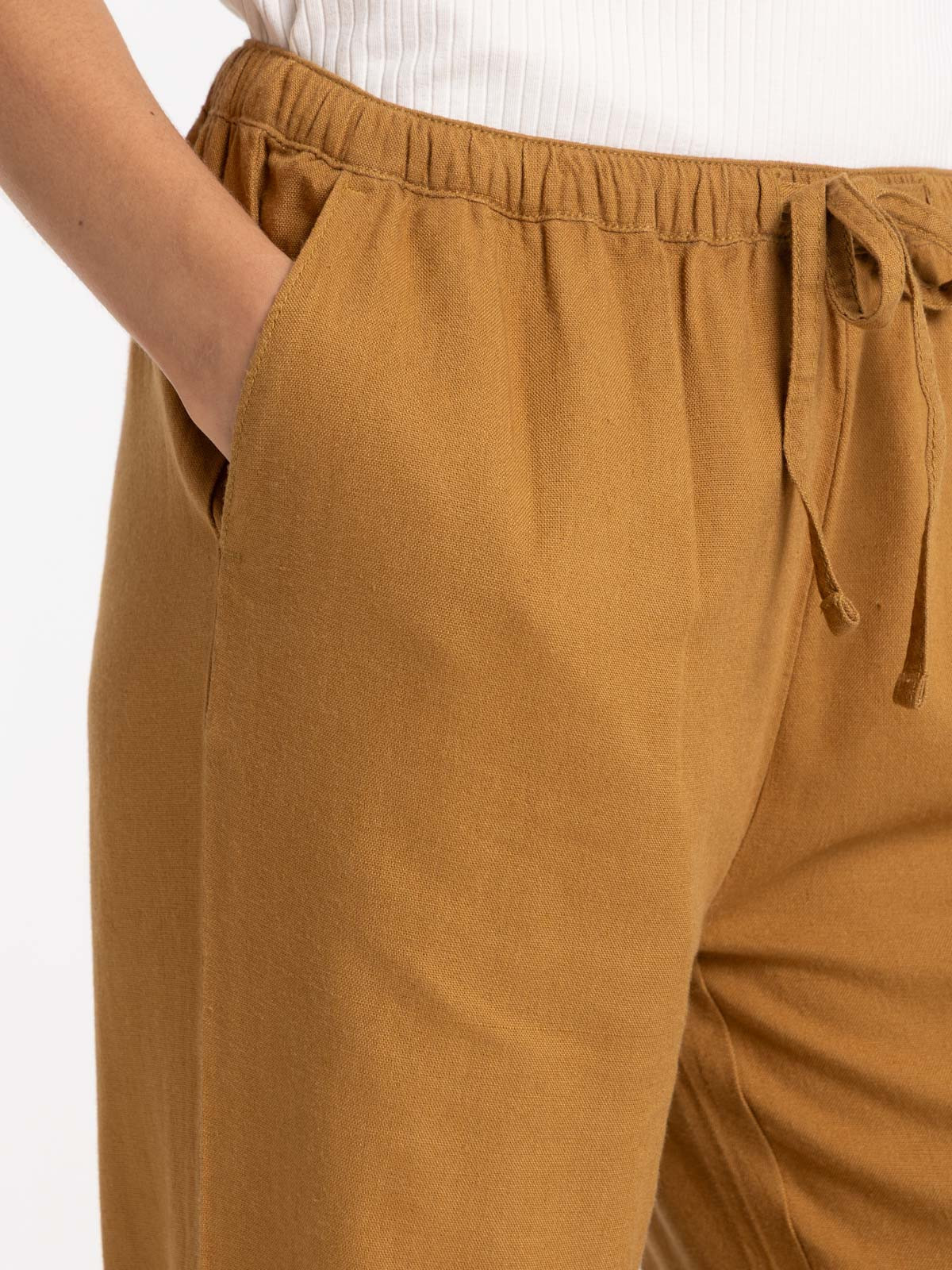 Pantalon en lin coloris bronze femme Pantalon en lin coloris bronze femme
