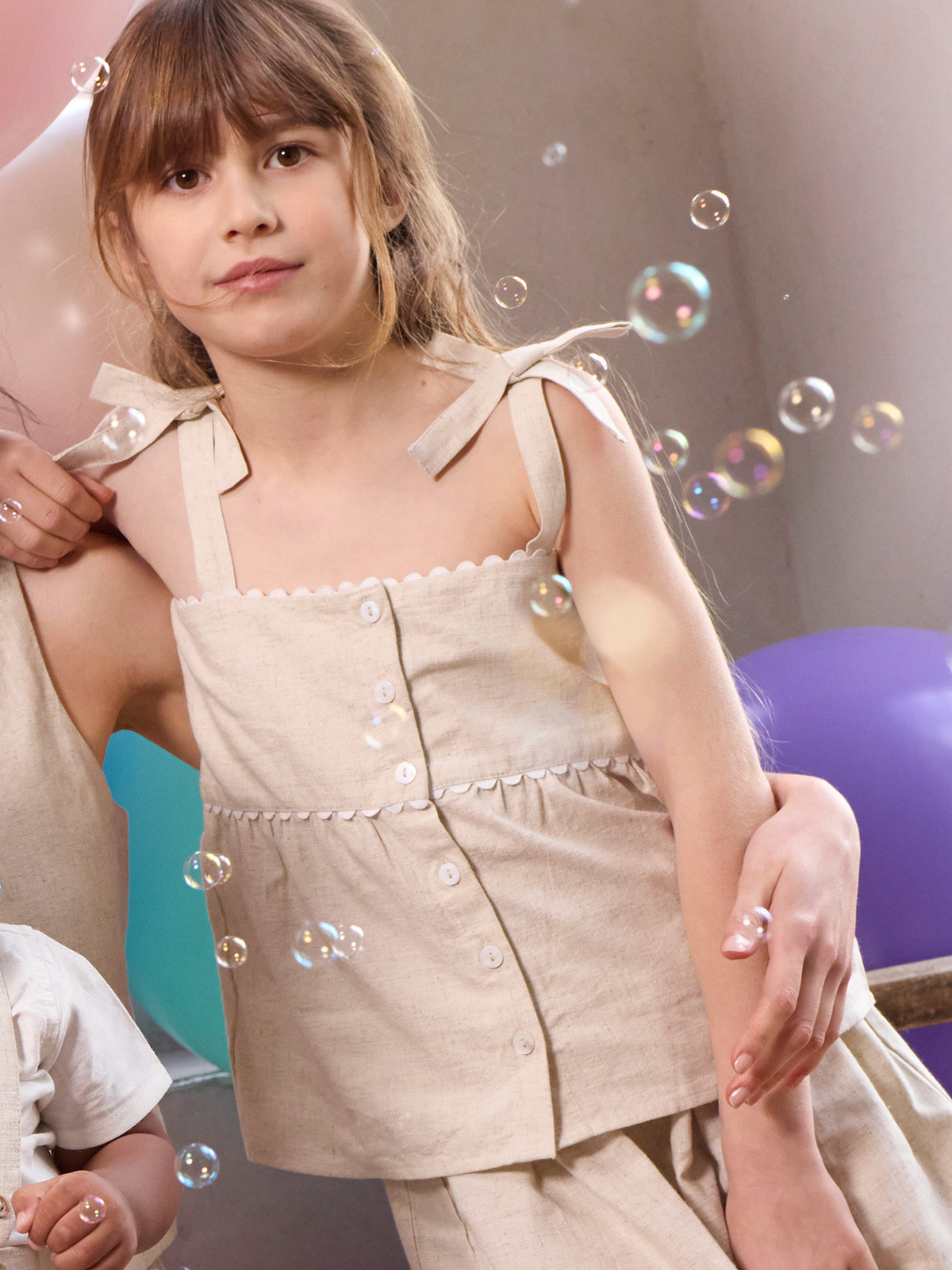 Blouse sans manches noeud fille (3-12A)