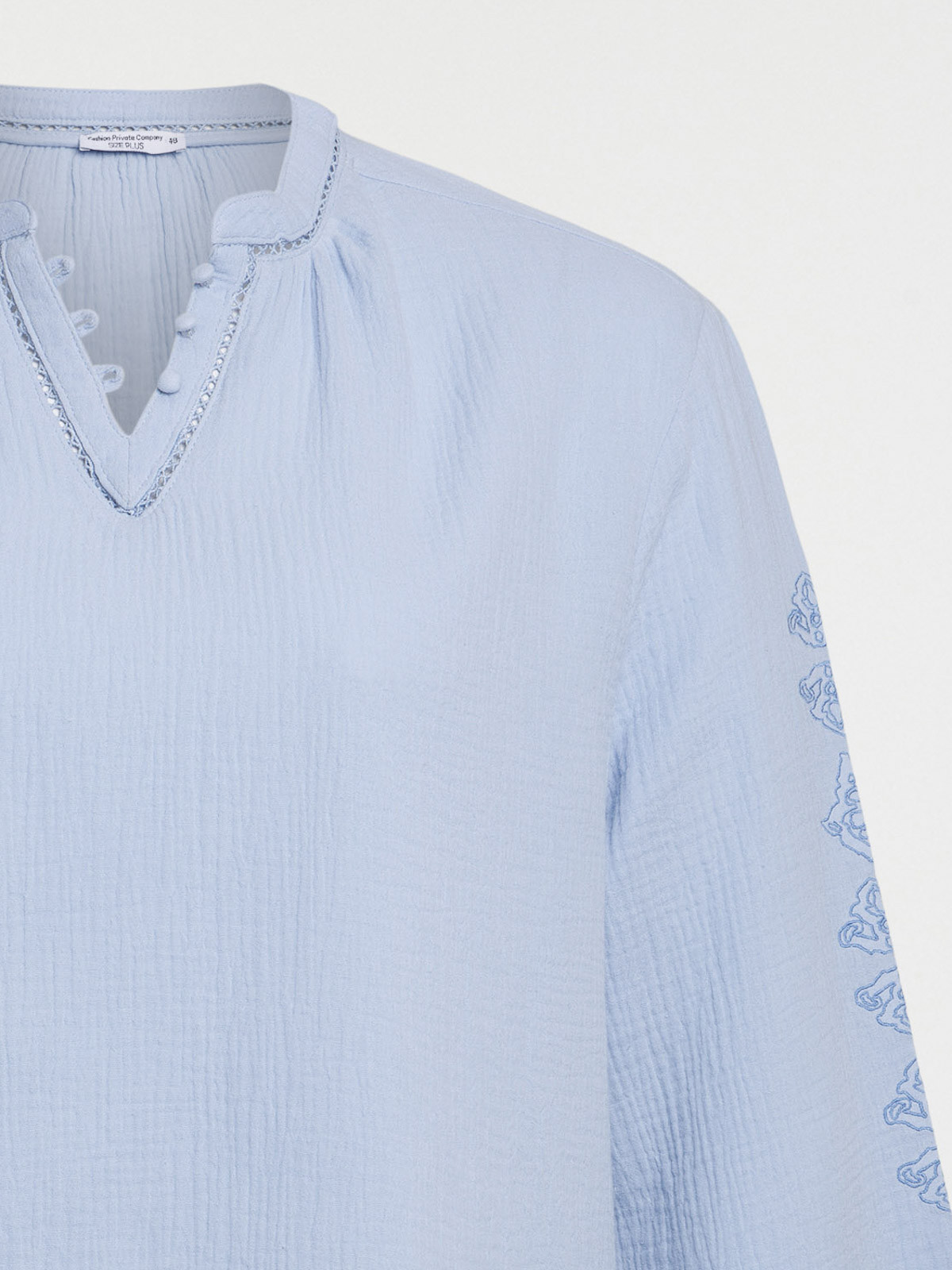 Blouse bleu pâle grande taille femme