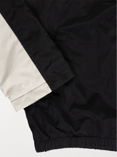 Blouson bicolore capuche...