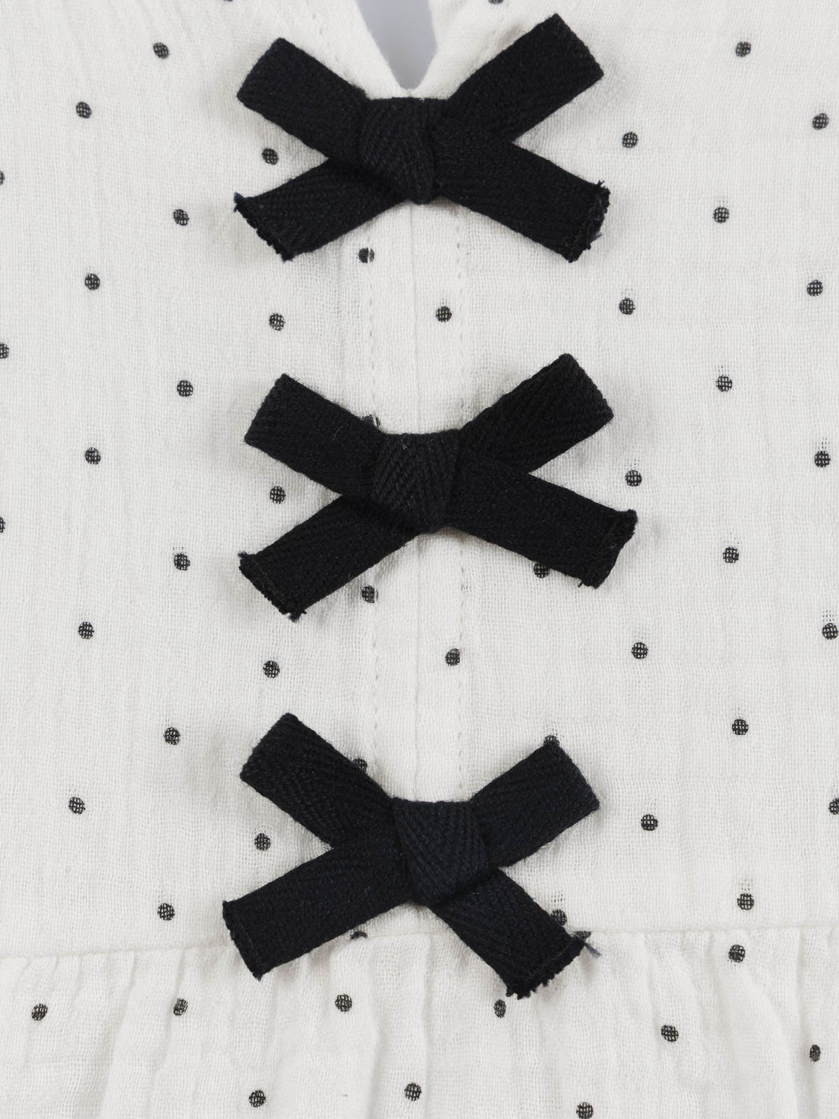 Blouse à pois et noeuds fille (3-12A) Blouse à pois et noeuds fille (3-12A)