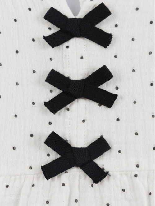 Blouse à pois et noeuds...