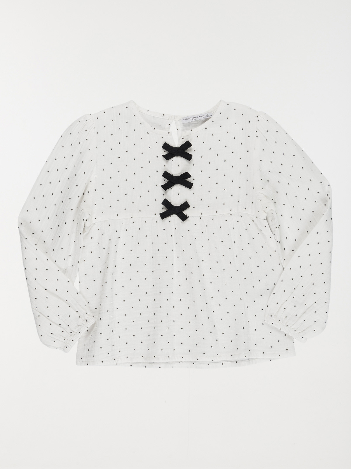 Blouse à pois et noeuds fille (3-12A) Blouse à pois et noeuds fille (3-12A)