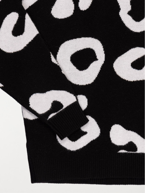 Pull noir col rond motif...