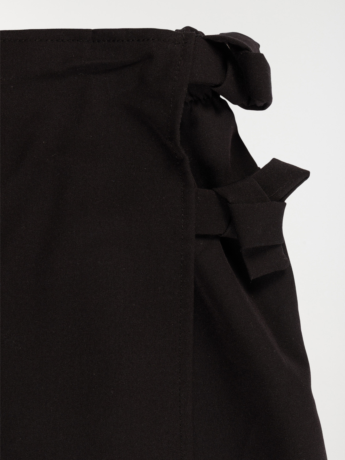 Jupe-short couleur noire fille (3-12A) Jupe-short couleur noire fille (3-12A)