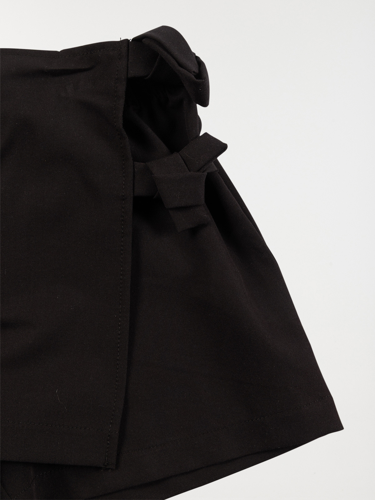 Jupe-short couleur noire fille (3-12A) Jupe-short couleur noire fille (3-12A)