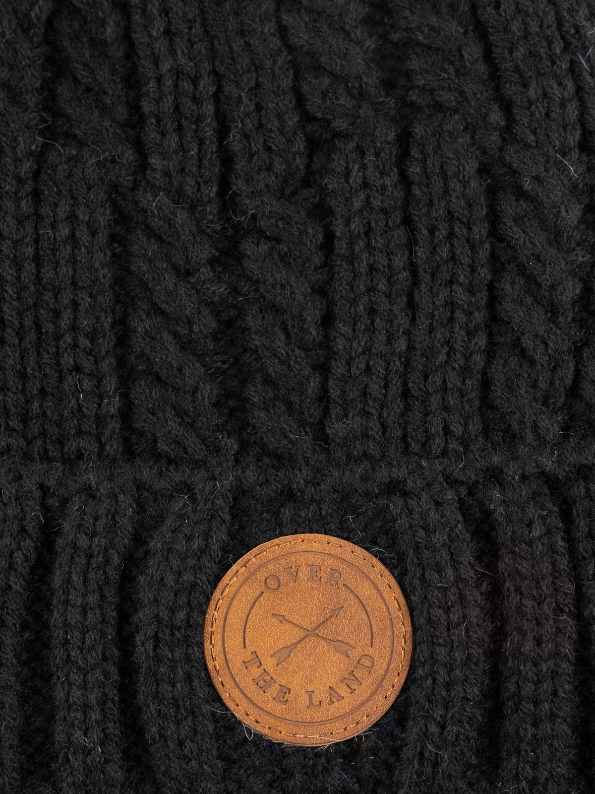 Bonnet torsadé et pompon femme Bonnet torsadé et pompon femme