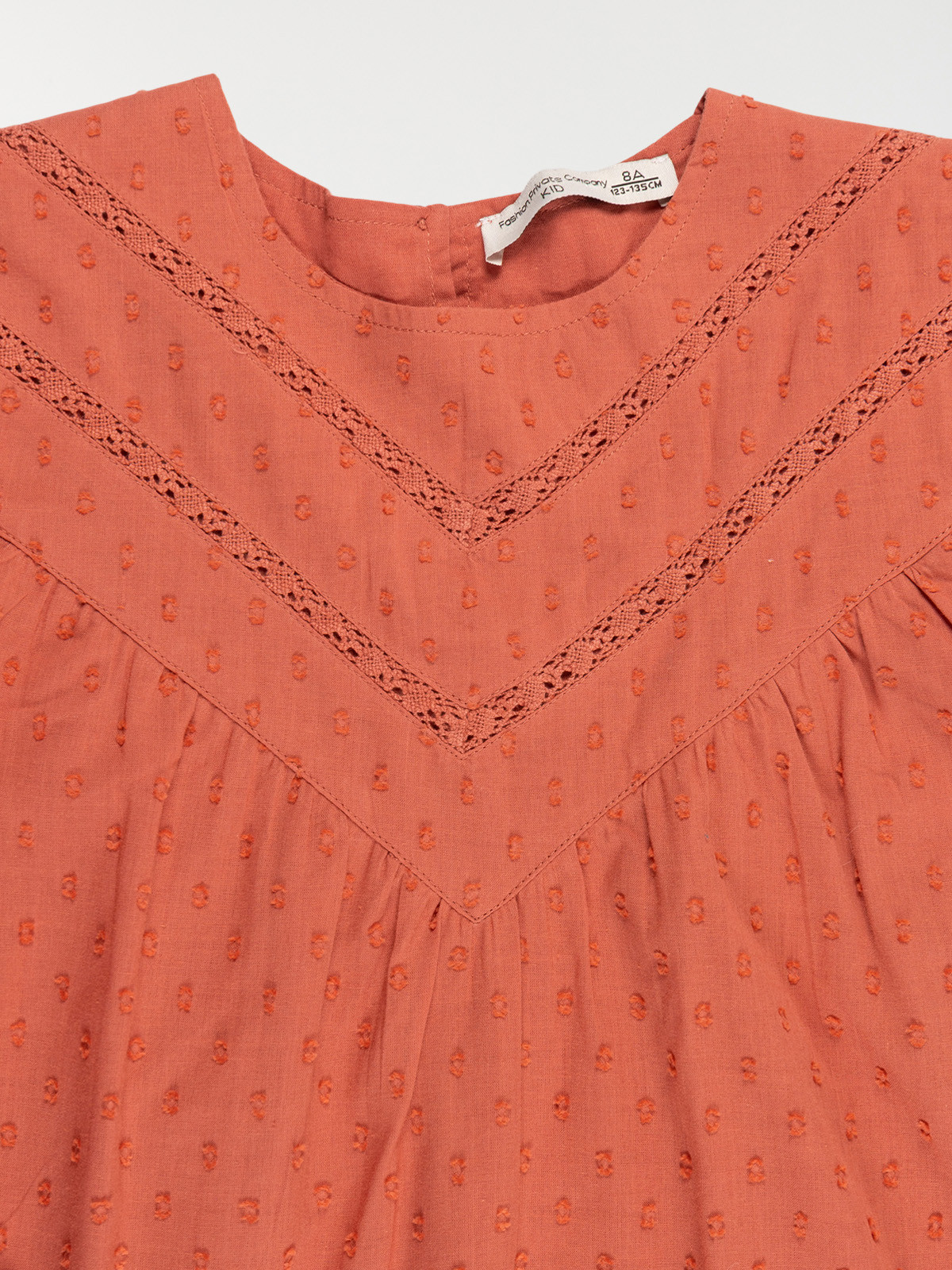 Blouse unie col rond fille (3-12A)