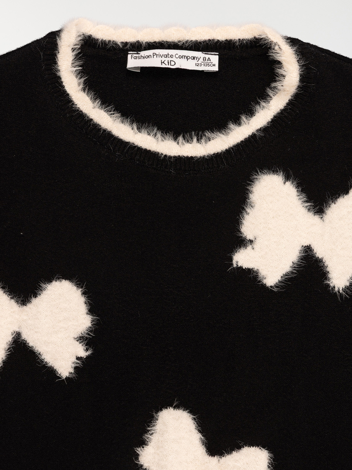 Pull fille noir noeuds (3-12A)