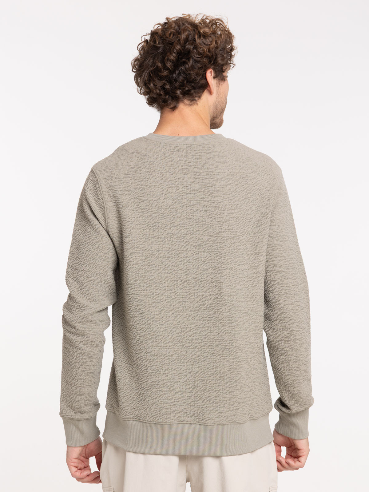 Sweat uni motif poitrine homme Sweat uni motif poitrine homme