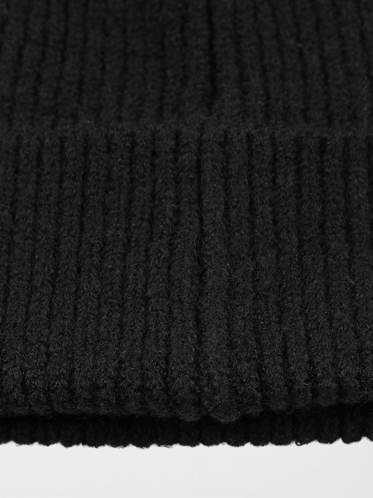 Bonnet en tricot noir femme Bonnet en tricot noir femme