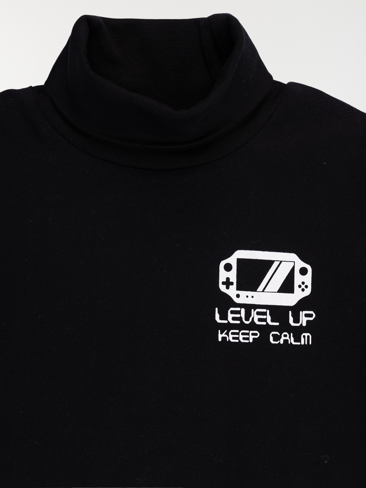 Tee-shirt noir col roulé garçon (3-12A)