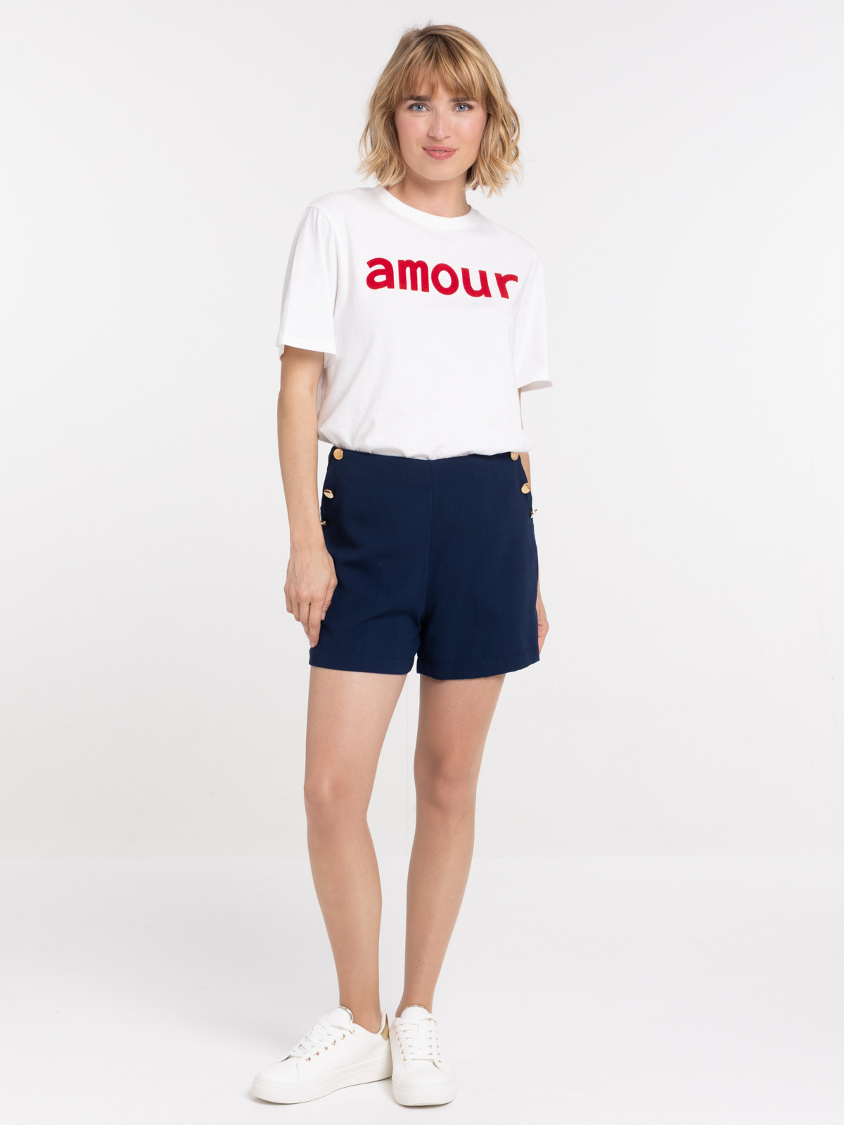 Short boutons dorés femme