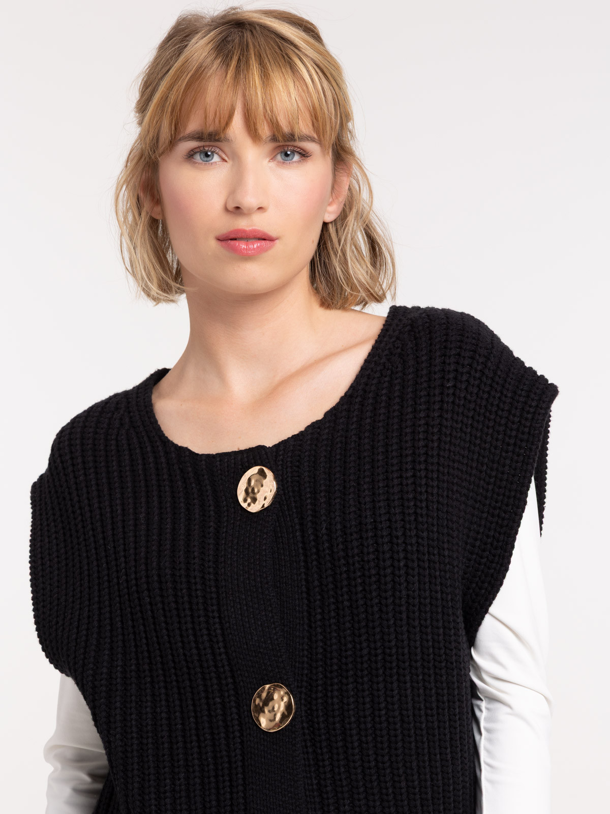 Gilet noir sans manches femme