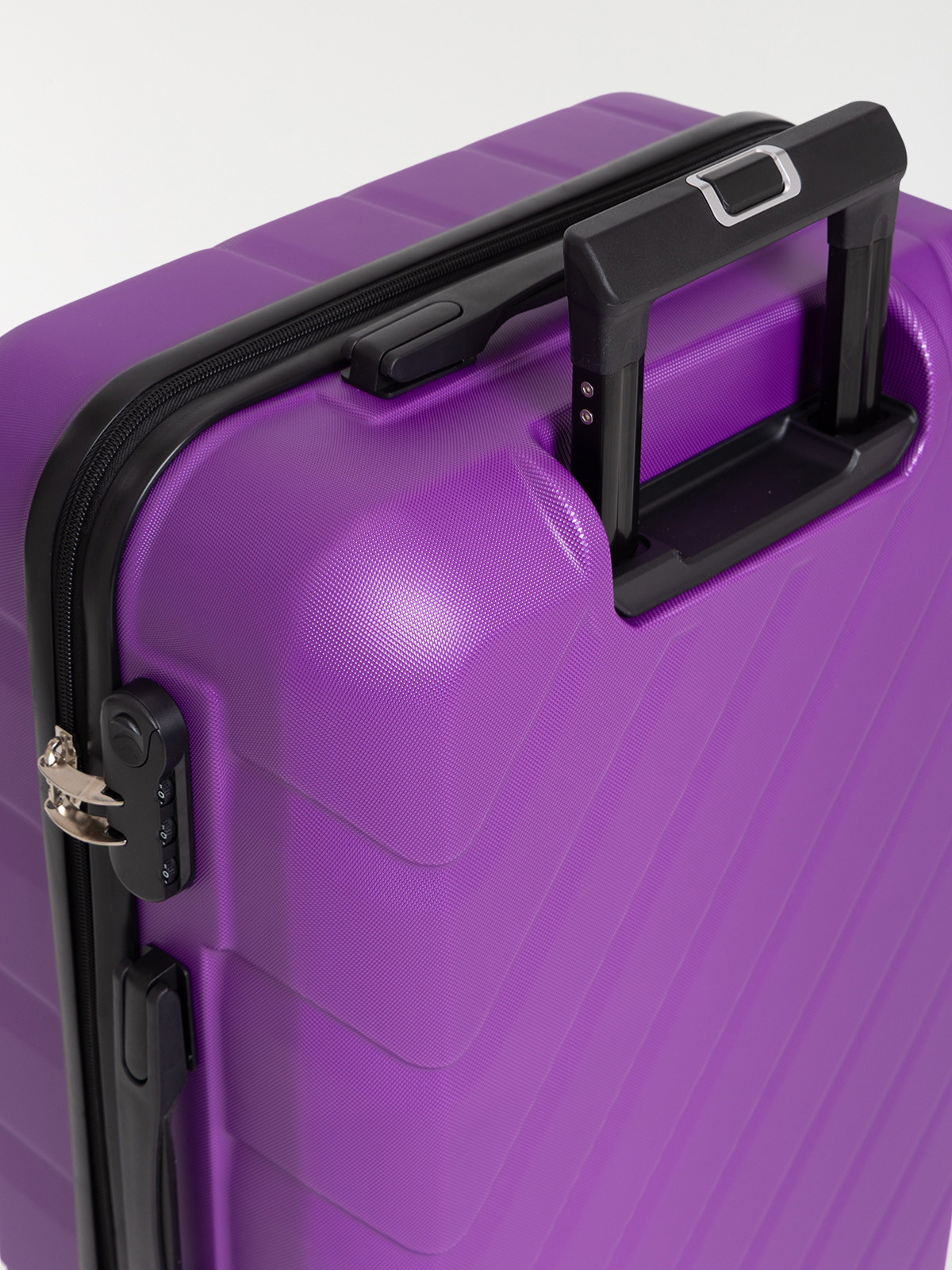 Valise rigide violette à roulettes