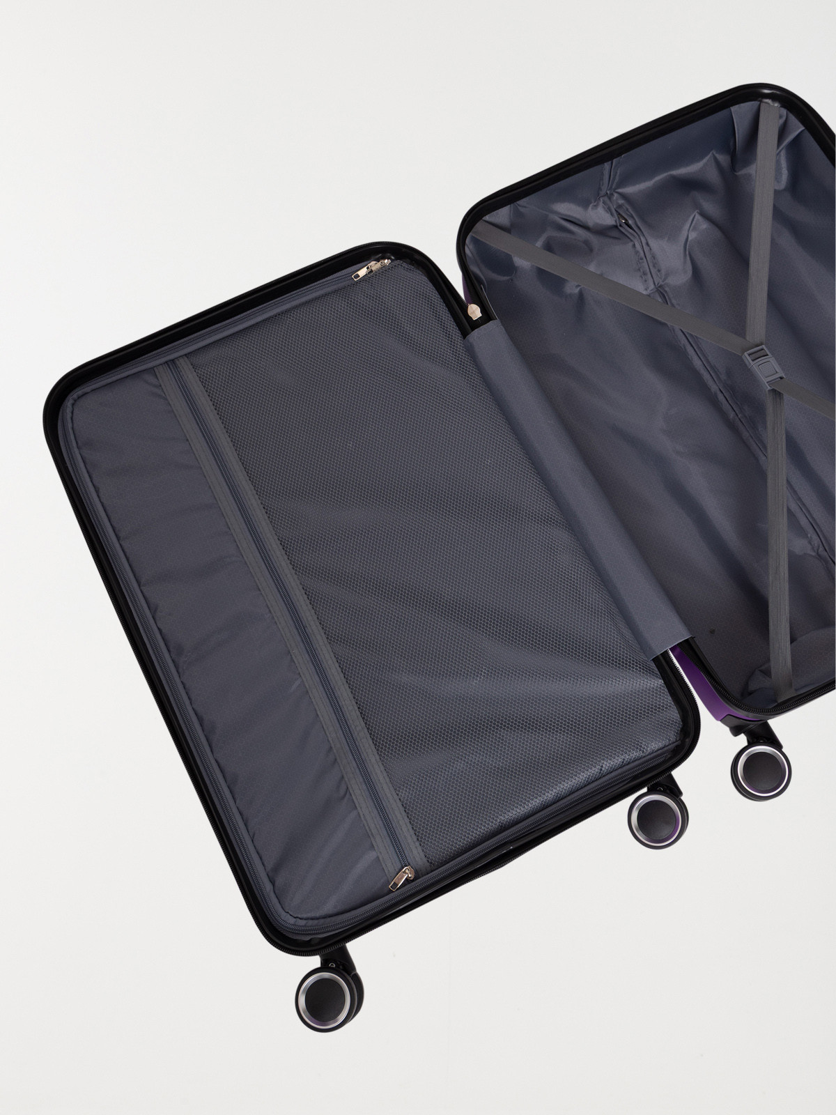 Valise rigide violette à roulettes